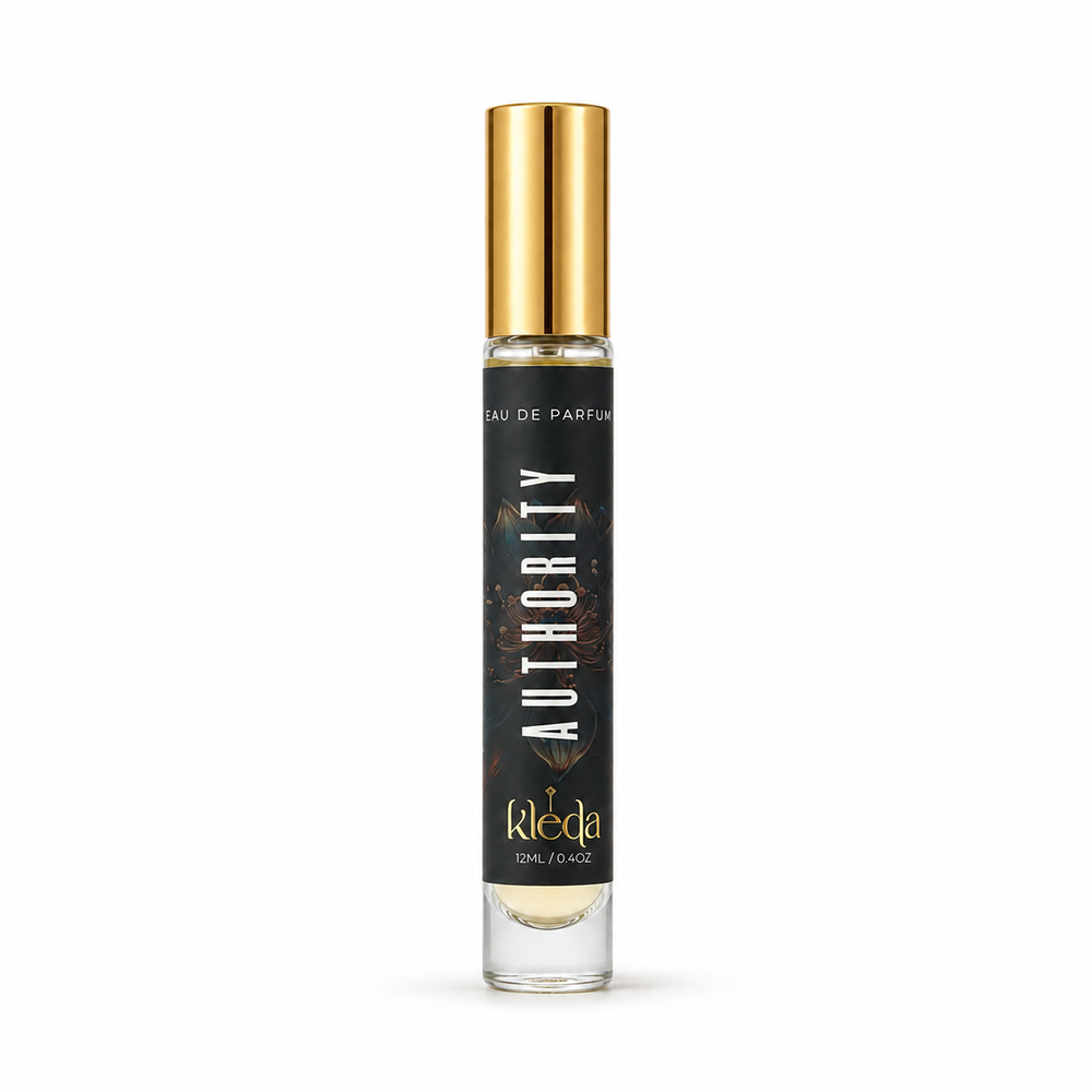 A 12ml spray perfume bottle by Kleda: Authority, featuring a black label with gold lettering and a shiny gold metallic cap, set against a plain white background.