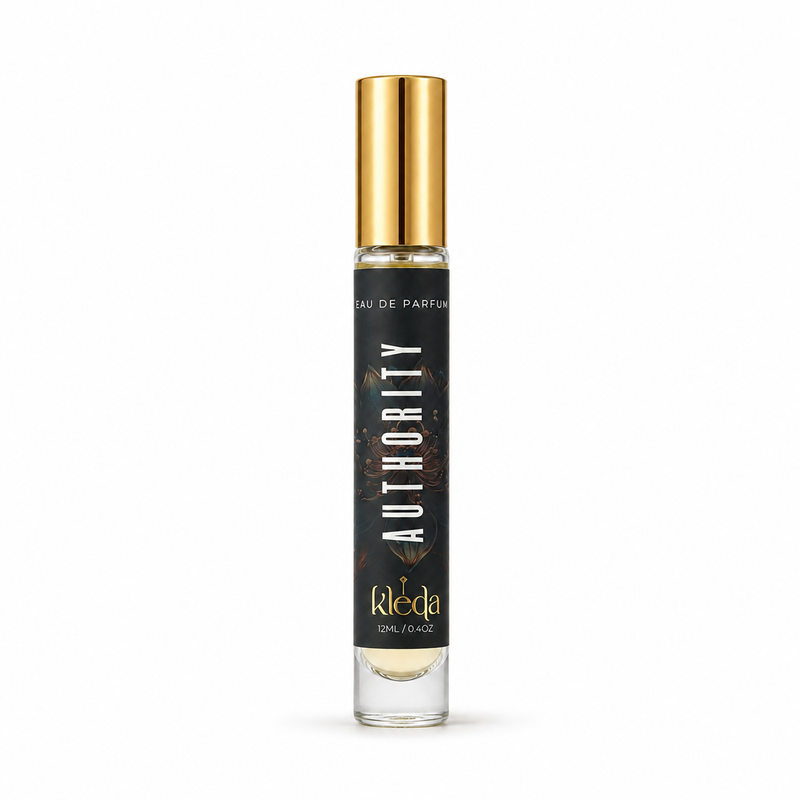 A 12ml spray perfume bottle by Kleda: Authority, featuring a black label with gold lettering and a shiny gold metallic cap, set against a plain white background.